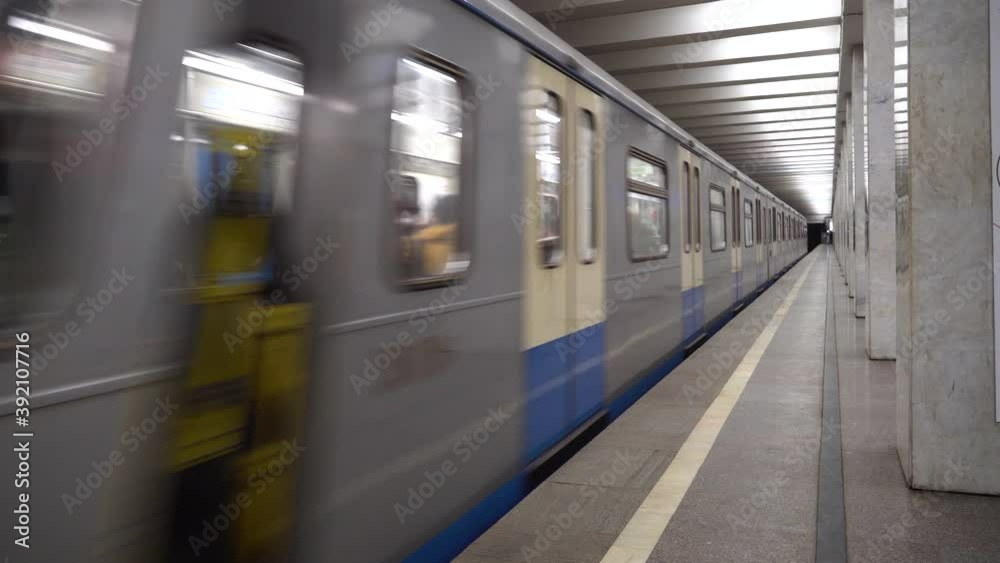 Departing train on underground metro or subway station Departing train on underground metro or subway station
