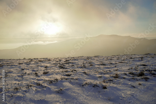 Panorama  on top of a snowy mountain range. Winter © Ivanna