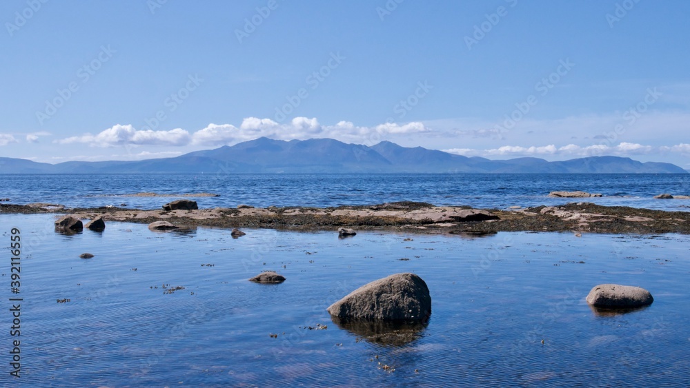 Scenic view of the mountainous island of Arran over the sea