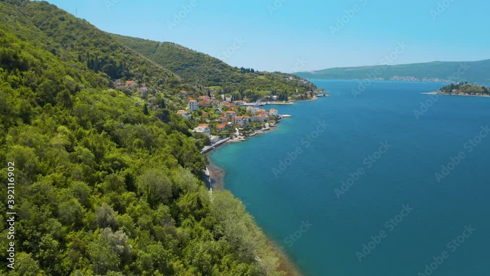 Perast, Montenegro. Aerial panoramic view of the beautiful seascape and mountains. Was filmed at summer day Perast, Montenegro. Aerial panoramic view of the beautiful seascape and mountains. Was filmed at summer day