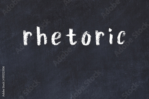 Foto Black chalkboard with inscription rhetoric on in