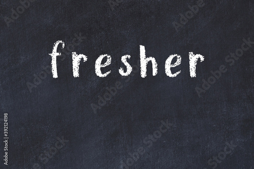 Quadro su tela College chalk desk with the word fresher written on in