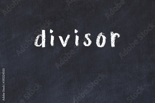 College chalk desk with the word divisor written on in