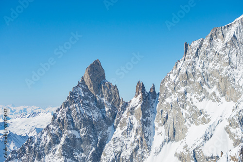 Sharpened peaks with snow and glaciers in the Monte Bianco (meaning "White Mountain") mountain range, Aosta Valley, Italy © Travelling Jack