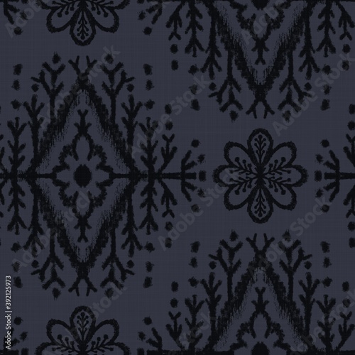 Seamless almost black tribal ethnic rug motif pattern. High quality illustration. Hand drawn symmetric native style design in dark gray and black with texture. Old artisan textile seamless pattern.