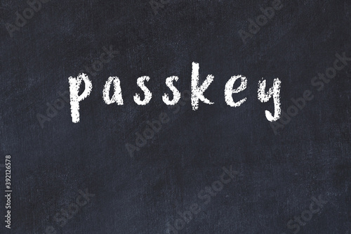 College chalk desk with the word passkey written on in