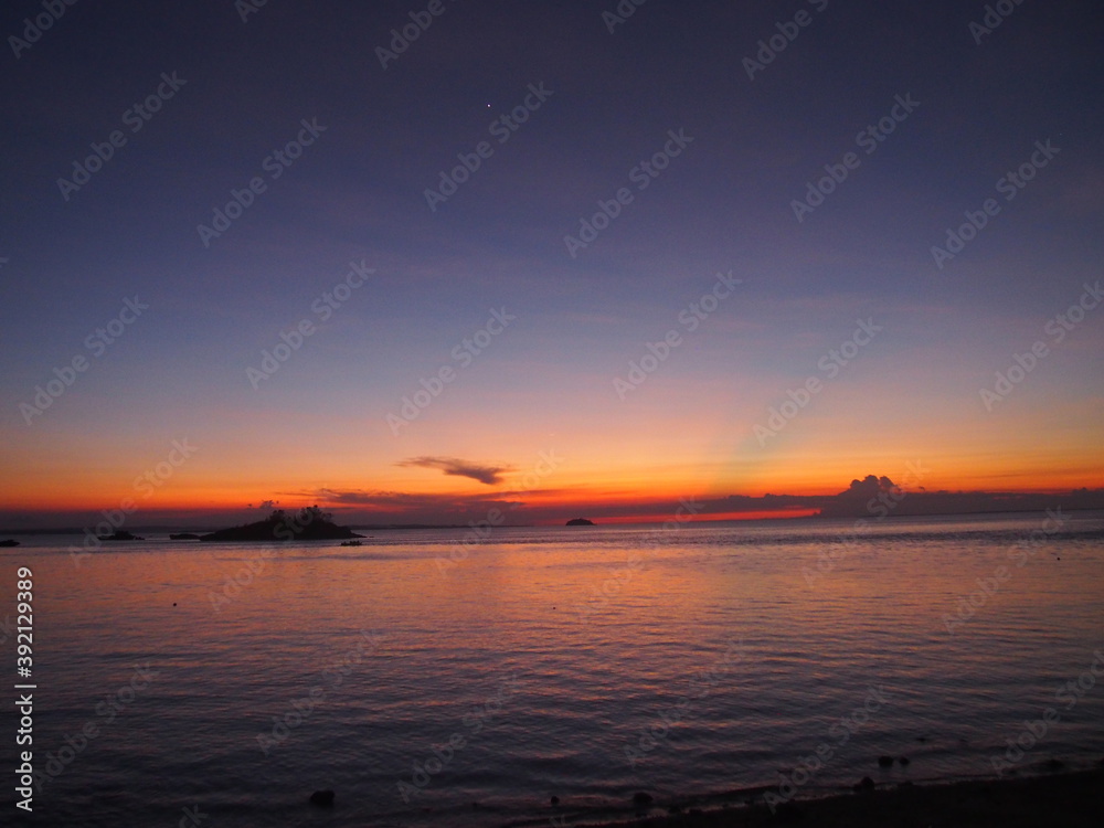 Beautiful sunset with an amazing gradation of color in the sky, Malapascua Island, Daanbantayan, Philippines