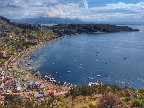 Aerial view - Lago Titicaca, Copacabana, Bolivia - Between Peru and Bolivia in the Andes Mountains, is one of South America's largest lakes and the world’s highest navigable body of water