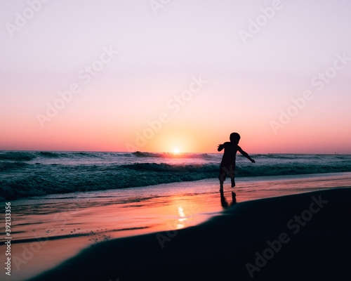 running on the beach © luke