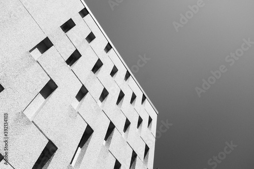 black and white building against sky photo