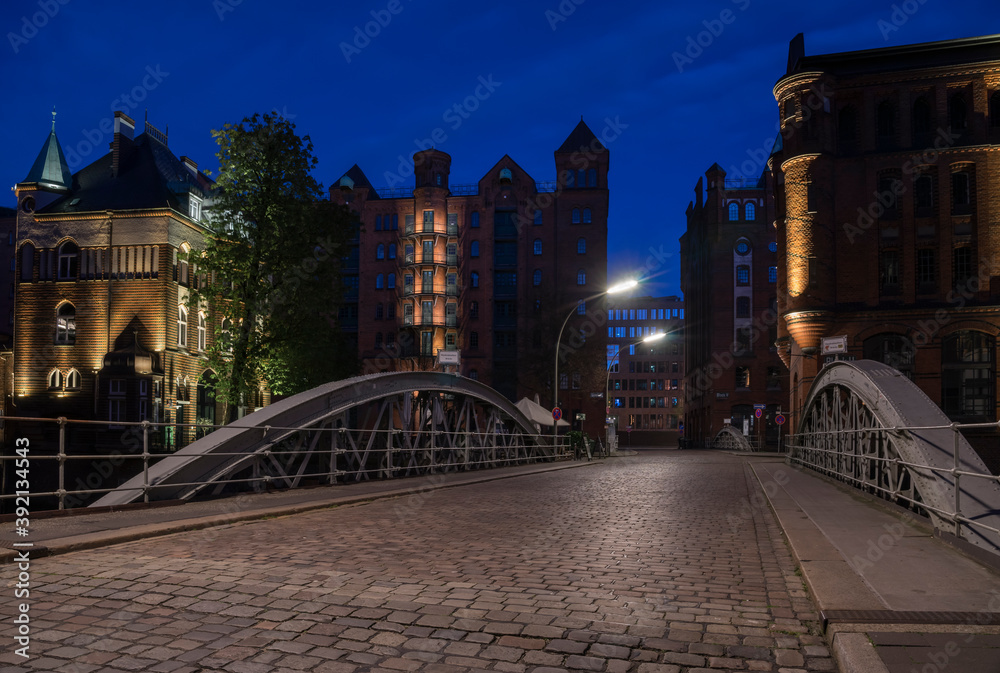 Night in the historic warehouse district of Hamburg.