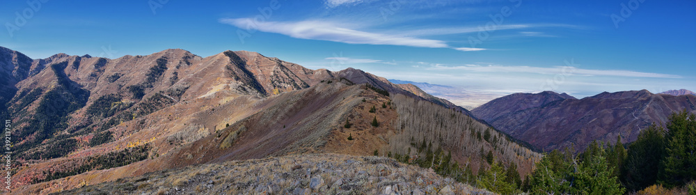 Butterfield Peak views of Oquirrh range toward Provo, Tooele, Utah Lake and Salt Lake County by Rio Tinto Bingham Copper Mine, in fall. Utah. United States.