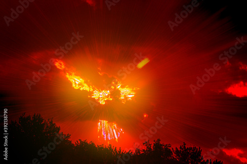explosion, fiery flash against a red ominous sky, demonic eyes and mouth