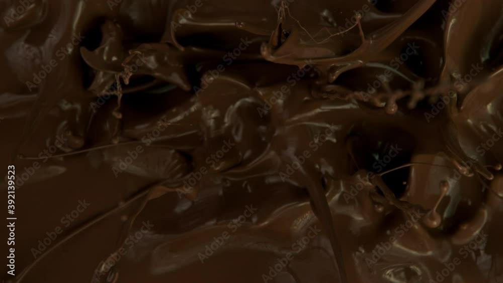 Super slow motion of hot chocolate. Filmed on high speed cinema camera, 1000fps. Super slow motion of hot chocolate. Filmed on high speed cinema camera, 1000fps.