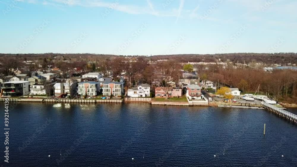 Aerial View of Waterfront Homes in Port Washington New York - Slider Shot R-to-L 1 Aerial View of Waterfront Homes in Port Washington New York - Slider Shot R-to-L 1