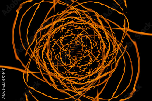 Fiery circles at night, mystical background. Geometric figure, candle at night on long exposure, Mandala magic