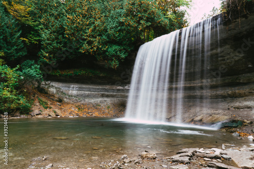Fototapeta Naklejka Na Ścianę i Meble -  Bridal Veil Falls on Manitoulin island. A 35 ft high photogenic waterfall during fall