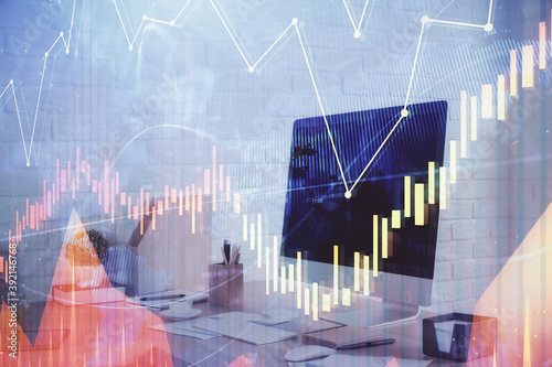 Double exposure of stock market graph drawing and office interior background. Concept of financial analysis. © peshkova