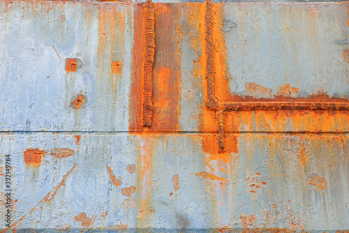 Concrete Wall with Rust and Chipped Paint Abstract