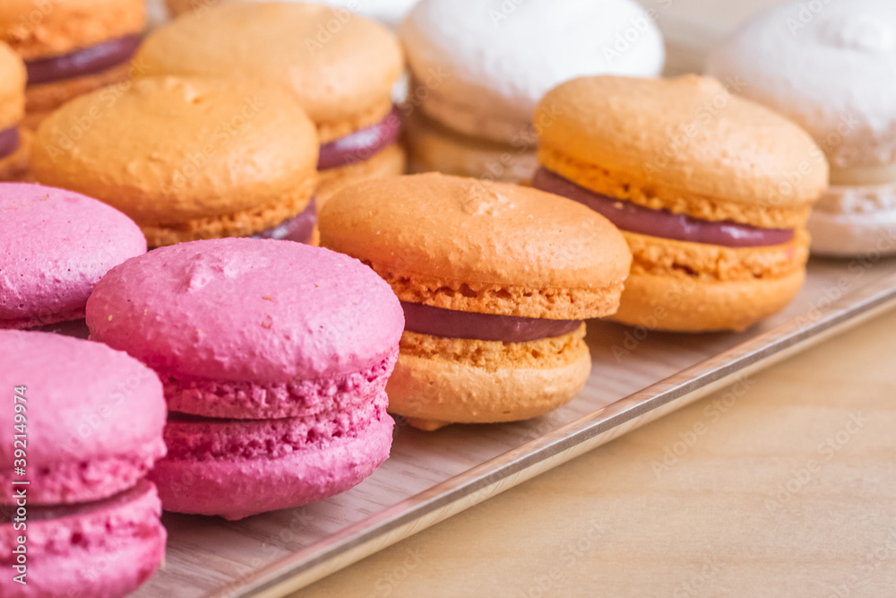 Multi-colored delicious macronies in the bakery Multi-colored delicious macronies in the bakery