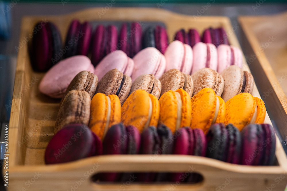 Multi-colored delicious macronies in the bakery Multi-colored delicious macronies in the bakery
