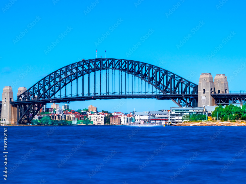 Obraz premium Panoramic Aerial views of Sydney Harbour with the bridge, CBD, North Sydney, Barangaroo, Lavender Bay and boats in view