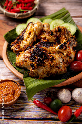 Ayam Taliwang or Ayam Betutu, famous Indonesia traditional food from Bali and Lombok. Grilled chicken with  local spices and herbs marinated 