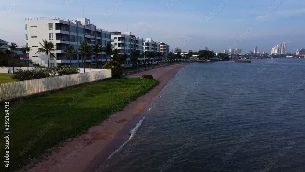 Early morning fly in low towards luxury beachside Thai apartments Early morning fly in low towards luxury beachside Thai apartments