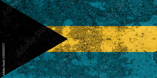 Flag of Bahamas painted on the old grunge rustic iron surface. Abstract paint of Bahamas national flag on the iron surface © DAWT_PHOTO