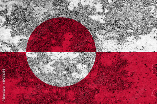 Flag of Greenland painted on the old grunge rustic iron surface. Abstract paint of Greenland national flag on the iron surface