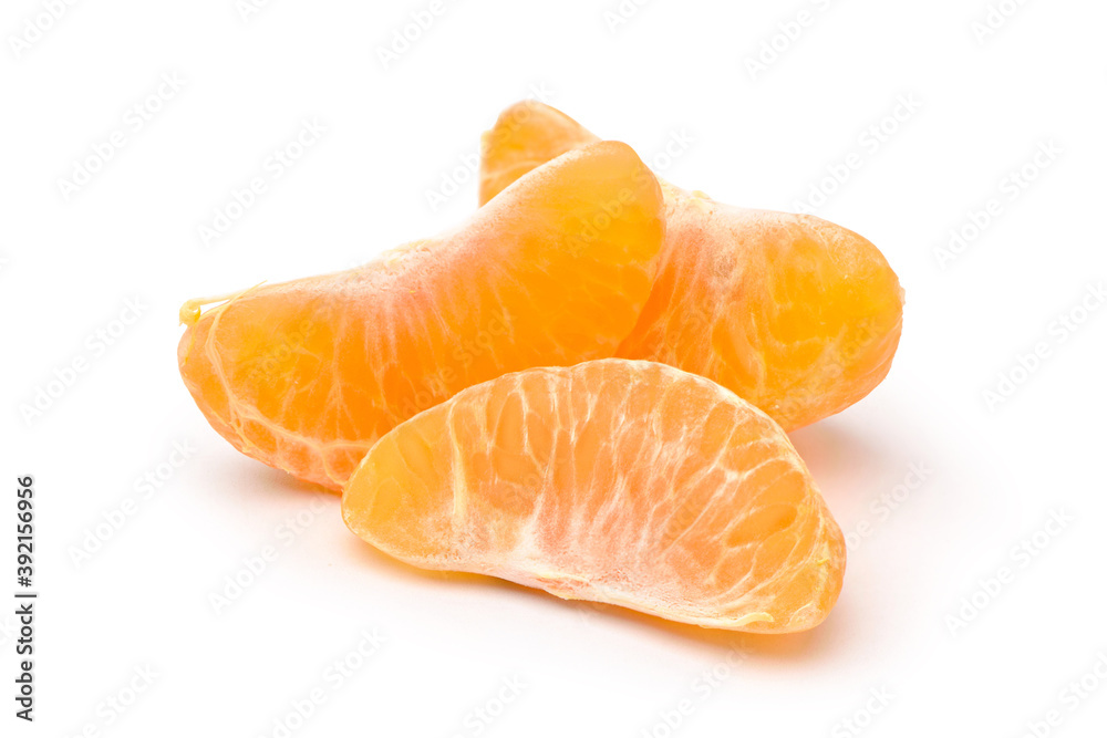 Close-up tangerine segment isolated on white background. Close-up tangerine segment isolated on white background.