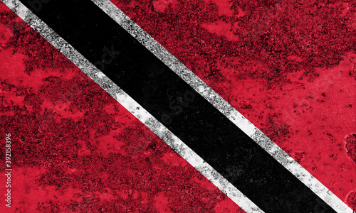 Flag of Trinidad and Tobago painted on the old grunge rustic iron surface. Abstract paint of Trinidad and Tobago national flag on the iron surface