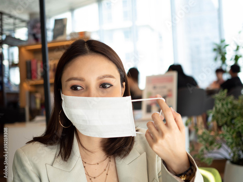 Businesswoman ceo manager company office wear white mask protection covid-19 rsv corona virus allegy phlegm fever influenza and female treatment health care medical hospital clinic laboratory 