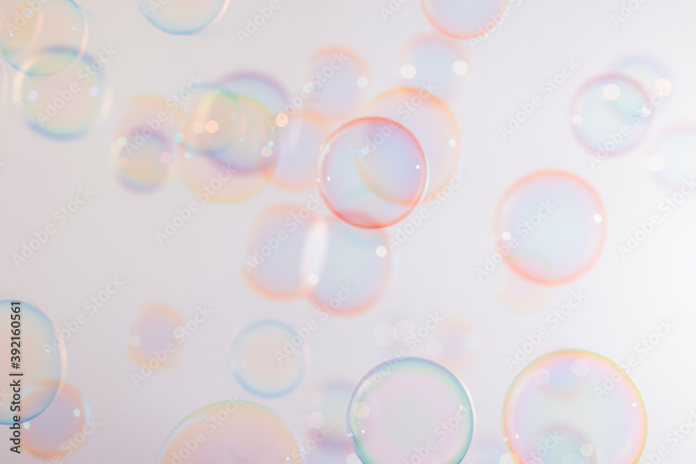 Beautiful colrful blur defocus pink soap bubbles floating in the air. Abstract, Celebration, Natual fresh summer, Chrimas holiday background.