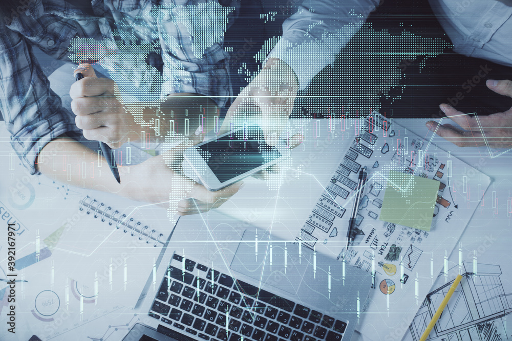 Double exposure of forex graph drawing and man and woman working together holding and using a mobile device. Trade concept. Double exposure of forex graph drawing and man and woman working together holding and using a mobile device. Trade concept.