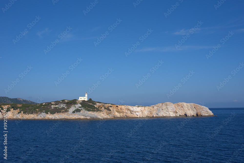beautiful lonely lighthouse, Skiathos island, Greece