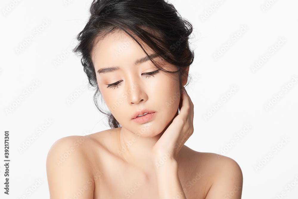 Beautiful young asian woman with clean fresh skin on white background, Face care, Facial treatment, Cosmetology, beauty and spa, Asian women portrait Beautiful young asian woman with clean fresh skin on white background, Face care, Facial treatment, Cosmetology, beauty and spa, Asian women portrait