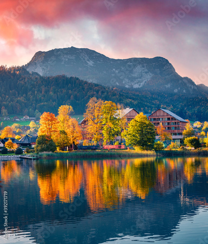Breathtaking sunrise on Altausseer lake, Austrian Alps. Impressive autumn morning on Altaussee village, Austria, Europe. Traveling concept background.