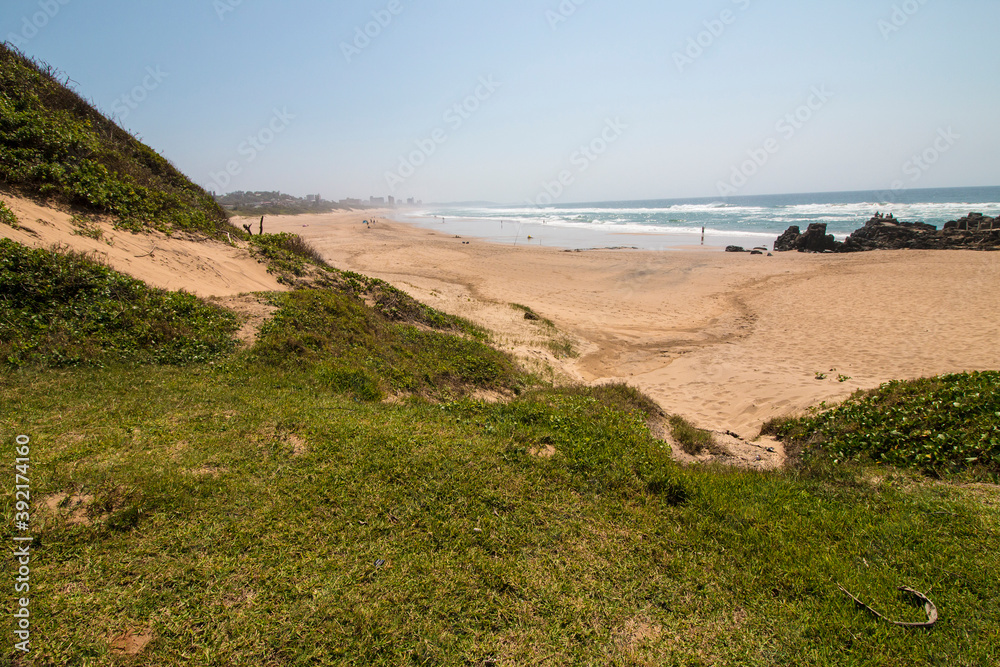 Natural Vegetation Covered Dunes Leading onto Sandy Beach