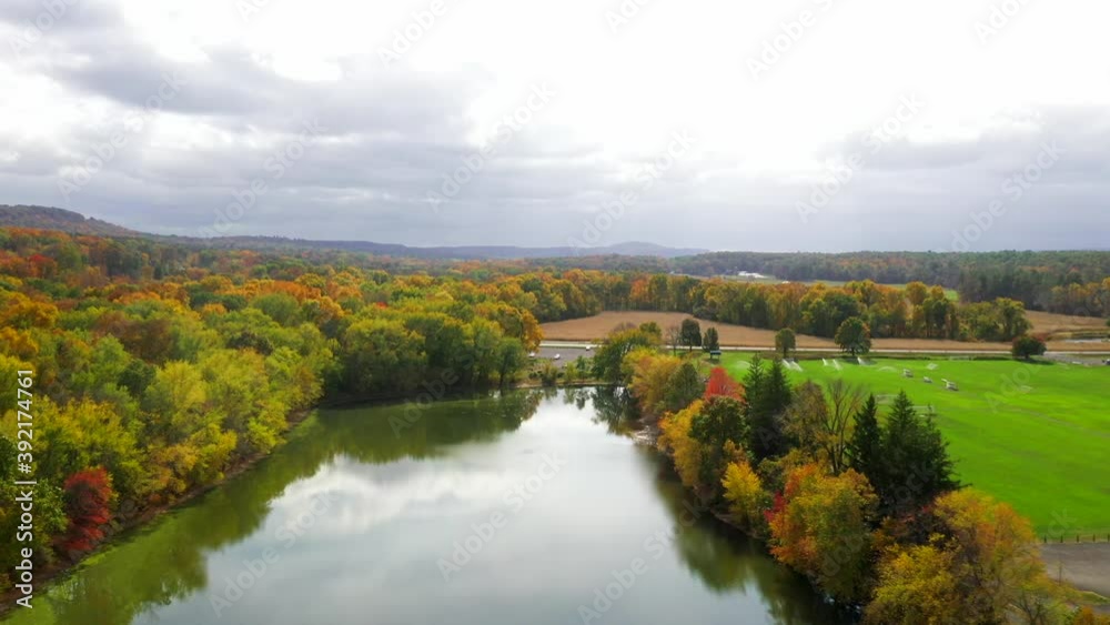 Aerial View of Fisher Meadows Lake Behind a Stunning Autumn Landscape Aerial View of Fisher Meadows Lake Behind a Stunning Autumn Landscape