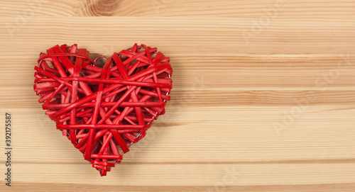 Red heart on a wooden background. Love. For a wedding or Valentine s Day