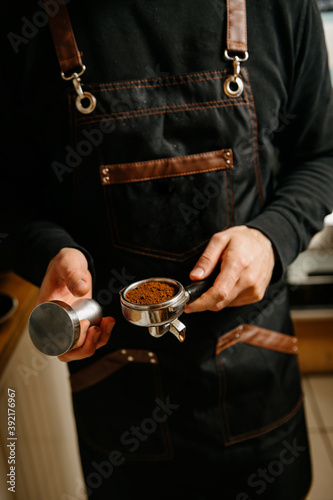 a person is making coffee