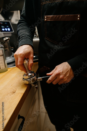 a person is making coffee