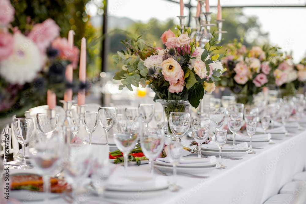 Wedding table with flowers for the newlyweds