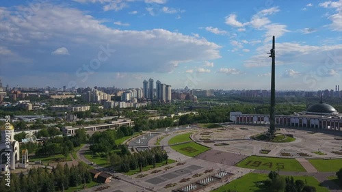 sunny day moscow city poklonnaya hill park cityscape aerial flight over panorama 4k russia