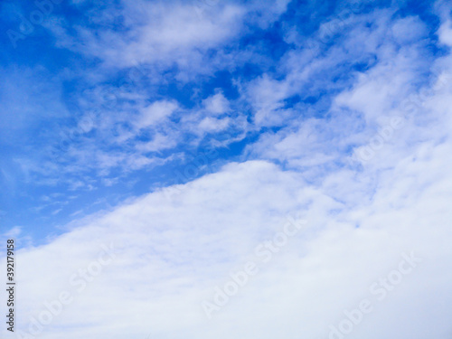 Clouds against blue sky as background.