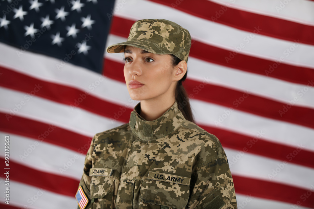 Female American soldier with flag of USA on background. Military service Female American soldier with flag of USA on background. Military service