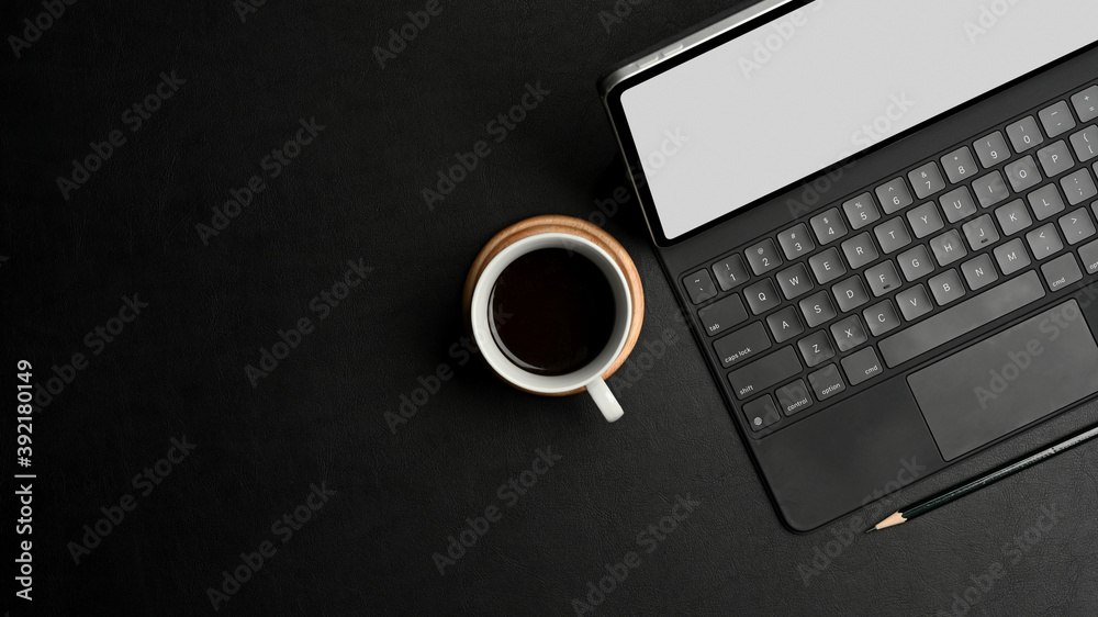 Black concept workspace digital tablet, keyboard, coffee cup and copy space, clipping path Black concept workspace digital tablet, keyboard, coffee cup and copy space, clipping path