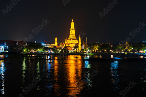Wat Arun with Chao Phraya river at night in Bangkok  Thailand