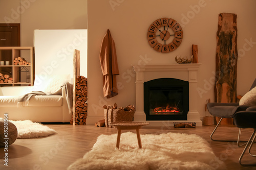 Beautiful view of cozy living room interior with fireplace